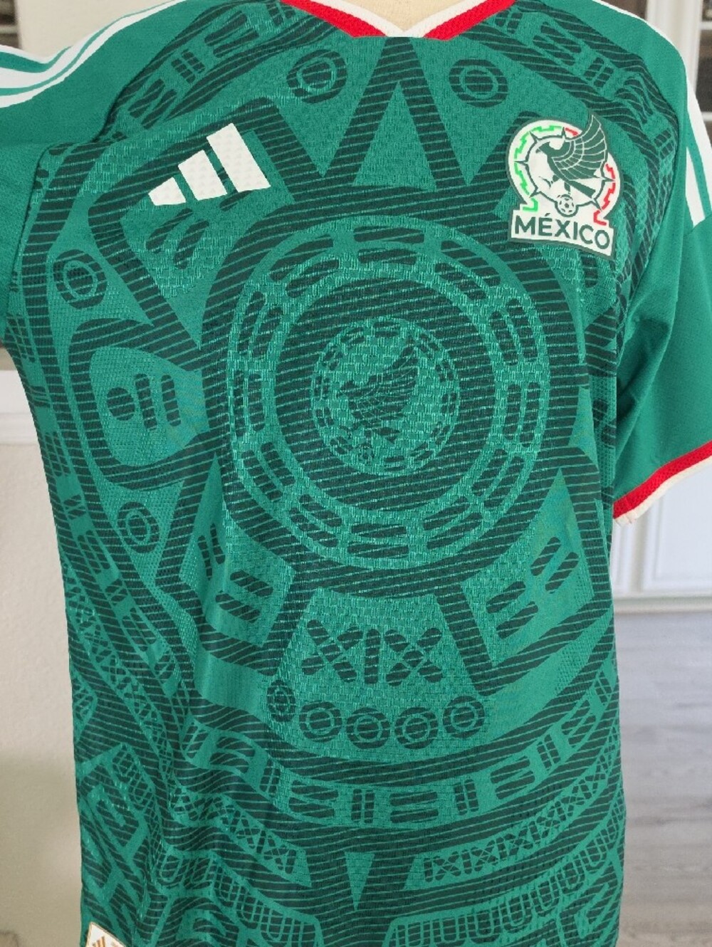 Green Soccer Jersey with Red and White Trim - Picture 9 of 11